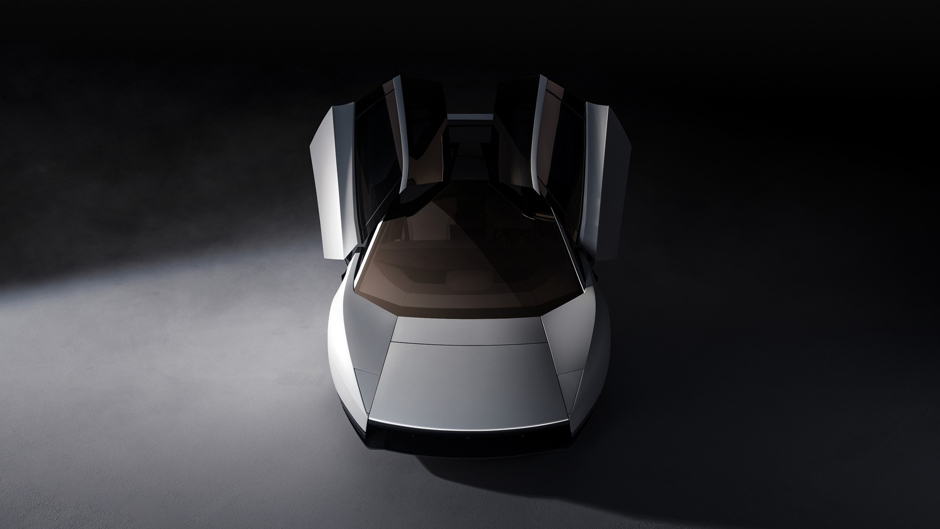 Tesla Roadster blanc vu de haut, les deux portes levées