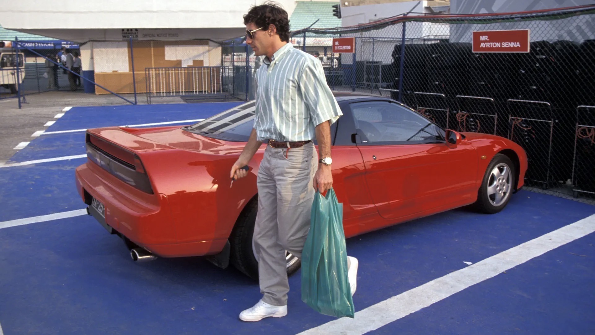 Ayrton Senna arrives at Circuito Estoril for the 1991 Portuguese Grand Prix in his Honda NSX.